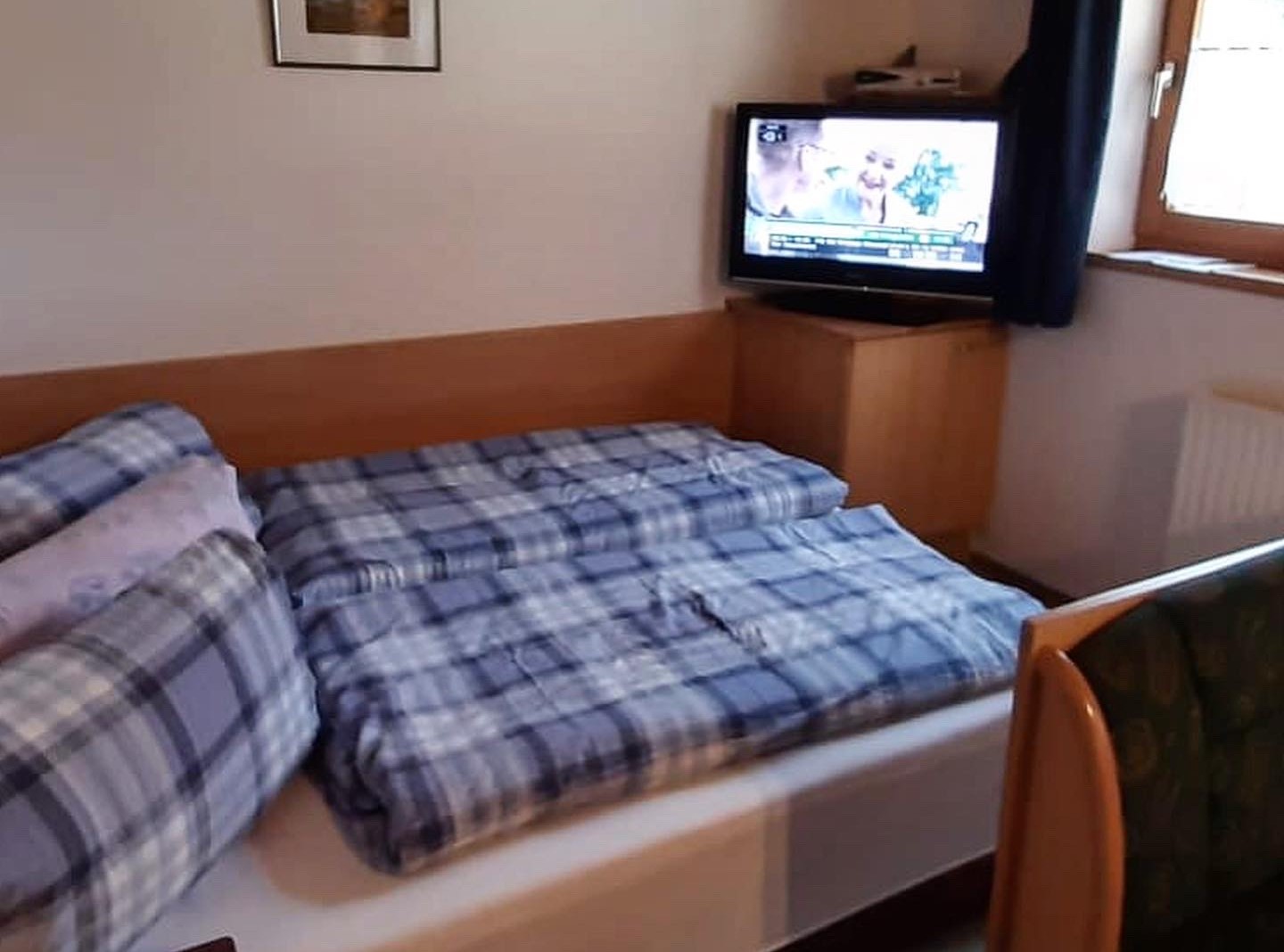 Wohnküche mit Bett